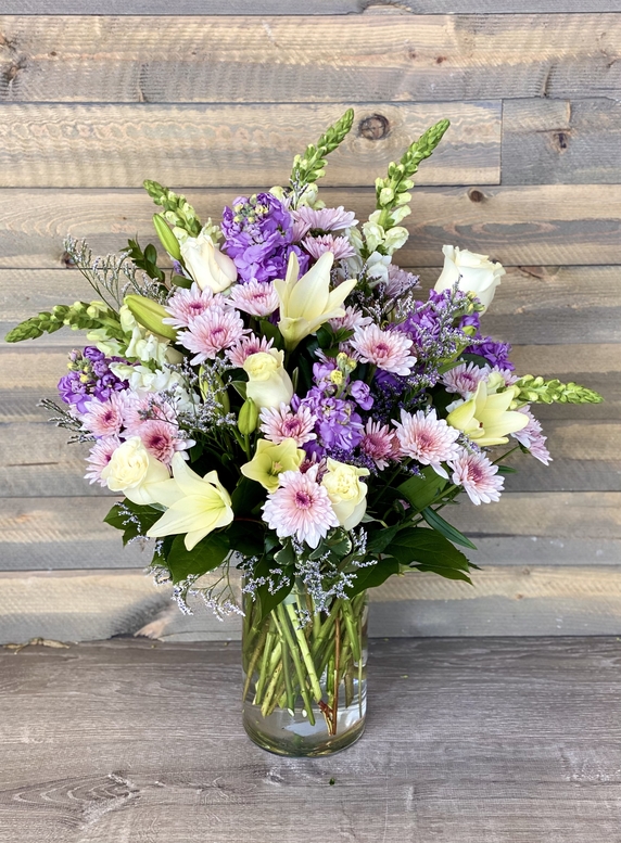  With Sympathy Lavender and White Flower Bouquet